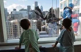 Window cleaners dress up as superheroes such as Batman and Superman at children's hospital, BumbleBar, BumbleBars
