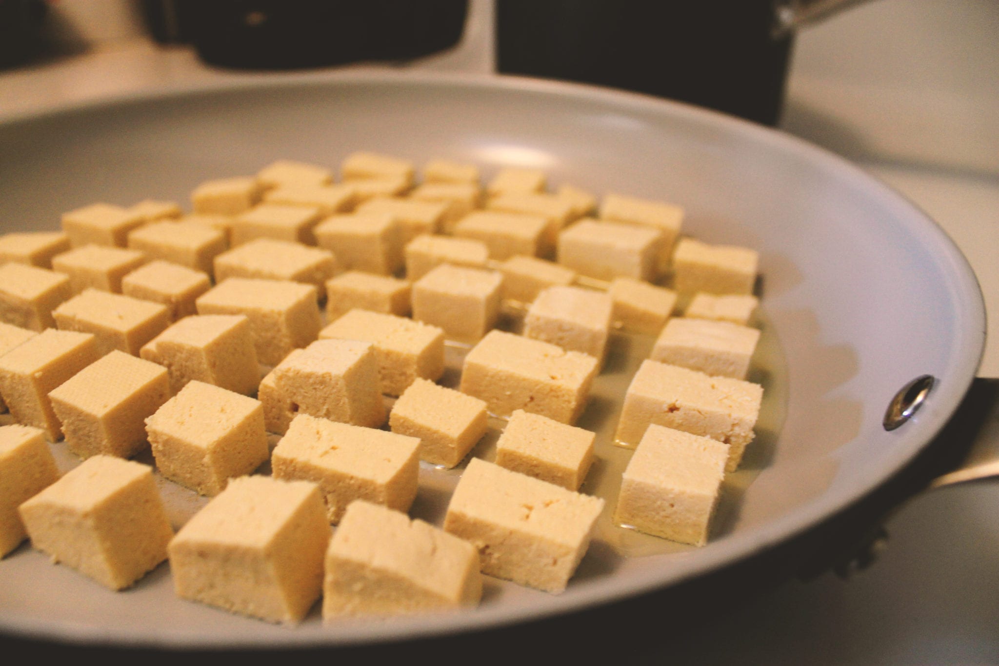 Tofu, Curry, Red Curry, Ingredients, Recipe, Tofu Recipe, Curry Recipe, Vegan Recipe, Vegan, Vegetarian, Pescatarian, BumbleBar, Tofu Tour, Olive Oil, Soy Sauce, Coconut Milk, Rice, Curry Paste, Maple Syrup, Cilantro, Lime Juice, Paprika, Cooking Tofu, Saucepan, Skillet, Frying Pan