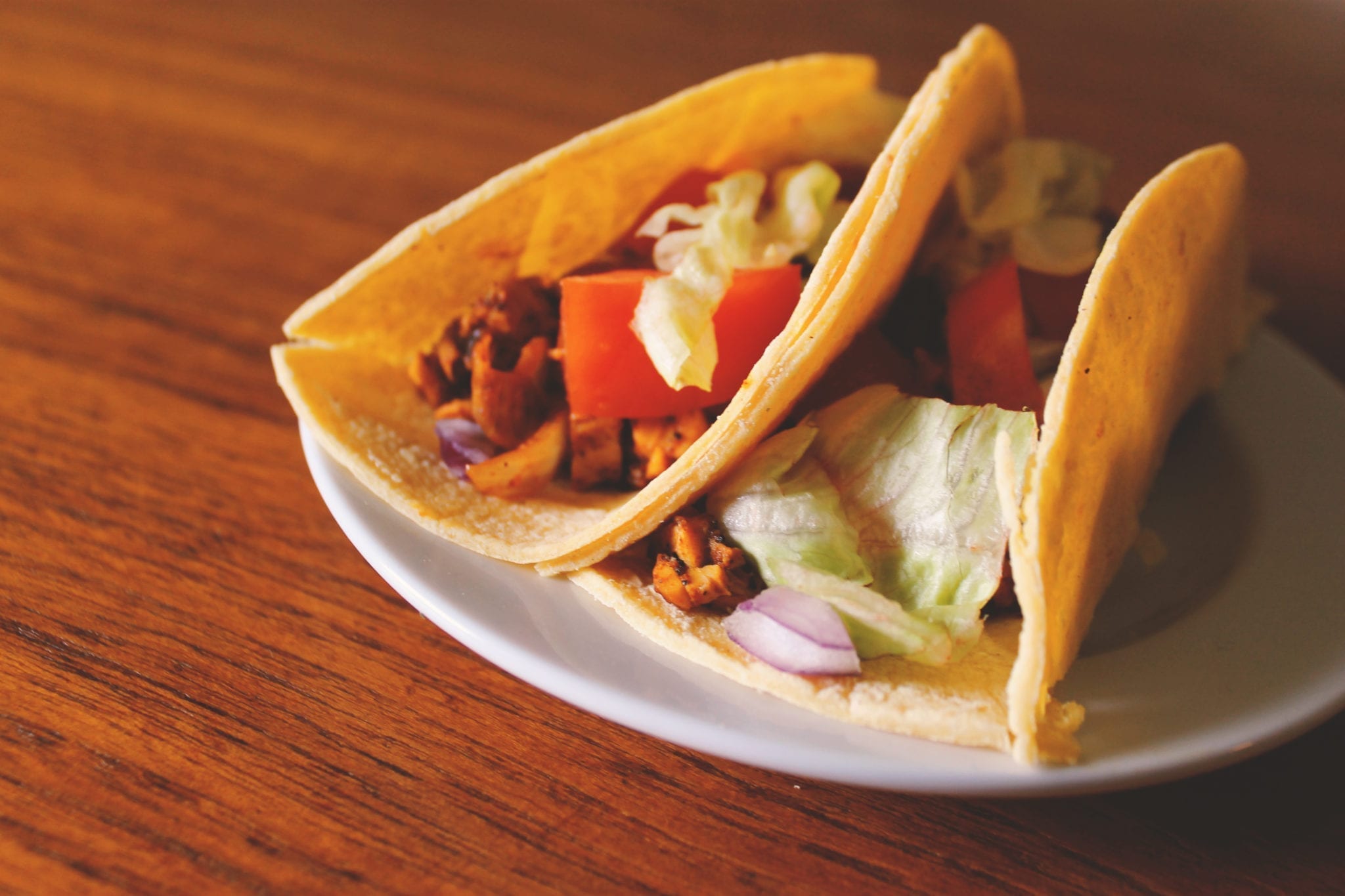 Tempeh, Tacos, Tempeh Tacos, Vegan Tacos, Vegan Tempeh Tacos, Lettuce, Red Onion, Yellow Onion, Tomato, Paprika, Sea Salt, Olive Oil, Cheyenne Pepper, Oregano, Chili Powder, Cumin, Garlic Powder, Tortilla Shells, BumbleBar, Vegan, Vegetarian, Recipe